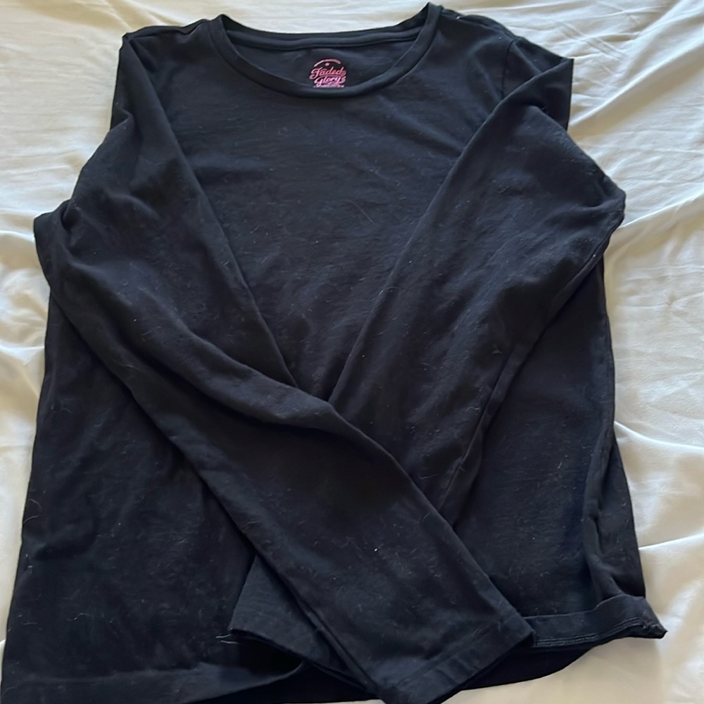 Plain black long sleeve; worn slightly